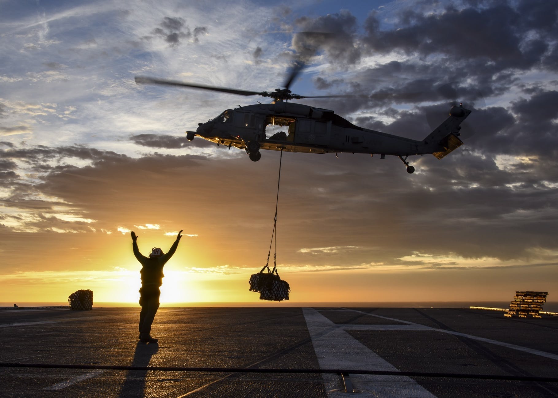 Helicopter dropping off a package